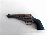 هفت تیر مسی قدیمی دکوری با دسته پلاستیکی   