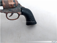 هفت تیر مسی قدیمی دکوری با دسته پلاستیکی   