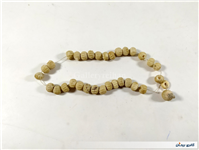 33 عدد مهره طرح دار ساخته شده از استخوان 